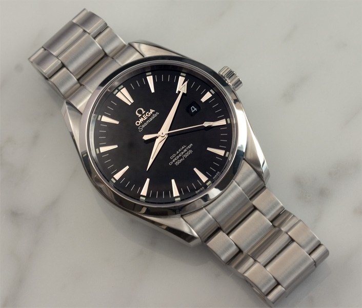 Tag heuer carrera calibre 5 vs omega shop aqua terra